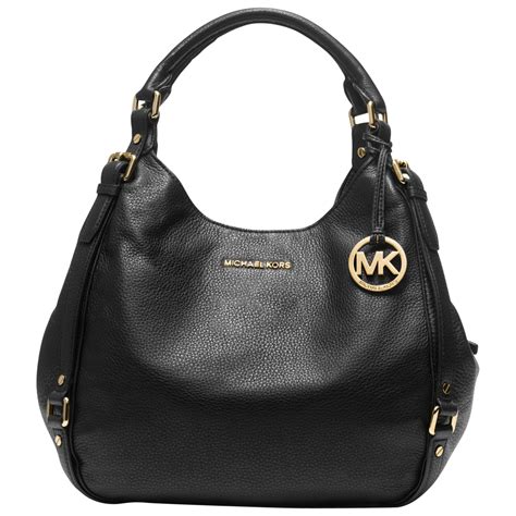 are michael kors handbags real leather|Michael Kors leather purse.